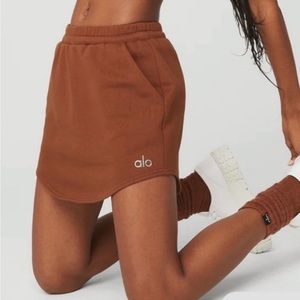 New worn once. It’s a more of a mauve purple color. Fits size 6-8.